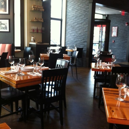 Photo taken at Rizzuto&#39;s Restaurant &amp; Bar by Christin G. on 6/8/2012