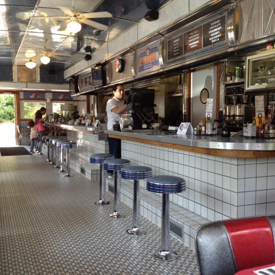 Photo taken at The Madison Diner by Linda C. on 7/10/2012