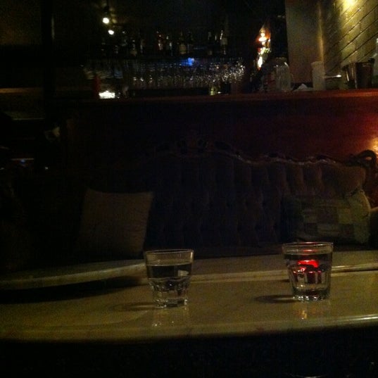 Photo taken at The Alchemist Bar &amp; Cafe by Pornti S. on 8/21/2012