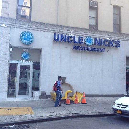 Photo taken at Uncle Nick&#39;s Greek Restaurant on 8th Ave by M R. on 7/6/2012
