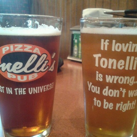 Photo taken at Tonelli&#39;s Pizza Pub by Damian C. on 6/3/2012
