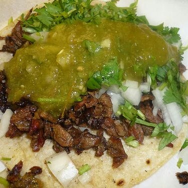 Photo taken at Paco&#39;s Tacos by Your Happy Hour Hero h. on 2/8/2012