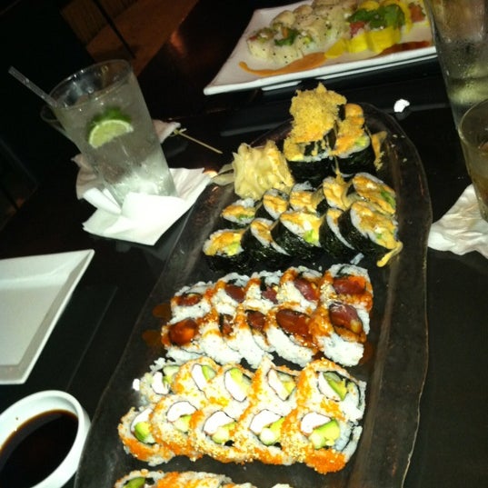 Foto diambil di Red Koi Thai &amp; Sushi Lounge oleh Christina L. pada 4/20/2012