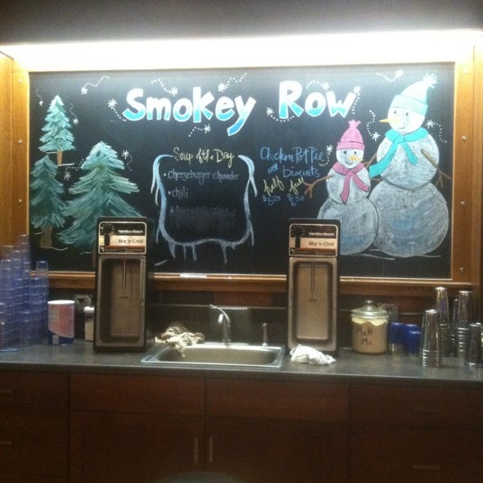 Photo taken at Smokey Row Coffee by Erin B. on 3/4/2012