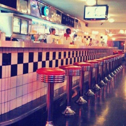 Photo taken at TRIXIE American Diner by Marcela D. (SU5) on 7/12/2012