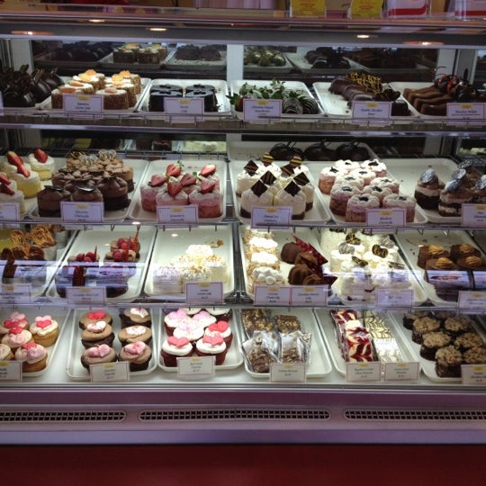 Photo taken at Indulgence Pastry Shop &amp; Cafe by Michiana360 on 2/14/2012