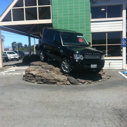 Photo taken at Jaguar / Land Rover by Jaclyn G. on 7/2/2012