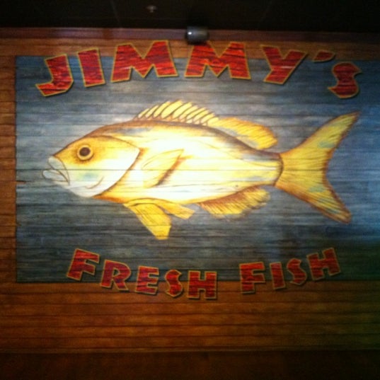 Photo taken at Jimmy&#39;s Island Grill &amp; Iguana Bar by Gwenn B. on 5/1/2012