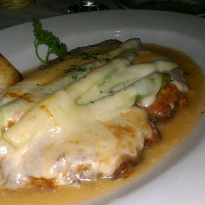 Photo taken at Enzo&#39;s Restaurant by Amanda G. on 4/13/2012