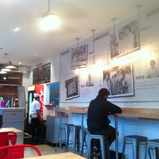 Photo taken at F. Ottomanelli Burgers and Belgian Fries by Esther on 2/24/2012