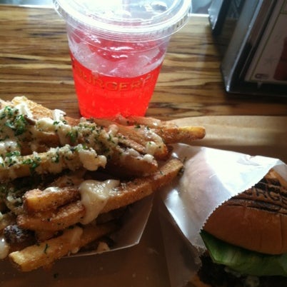 Photo taken at BurgerFi by Mason M. on 8/9/2012