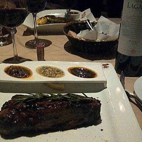 Photo taken at Ushuaia Argentinean Steakhouse by Marco M. on 8/18/2012