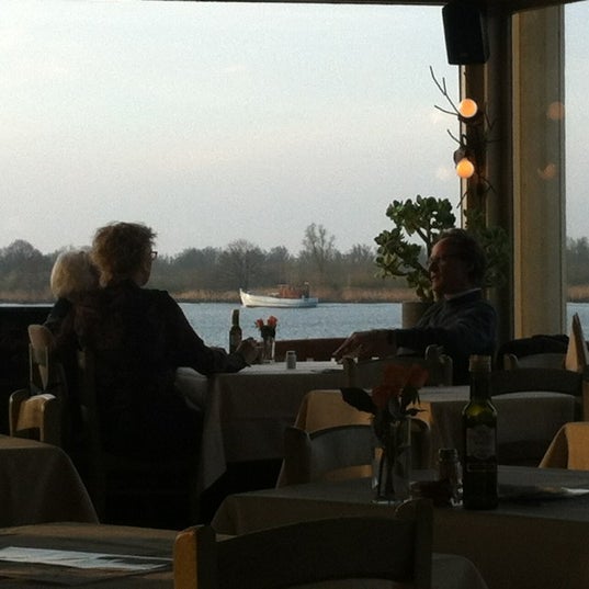 Photo taken at Het Panorama Restaurant/Grand-Café by Guido V. on 3/24/2012