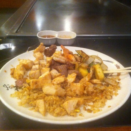 Photo taken at Atami Steak &amp; Sushi by Brett D. on 2/20/2012