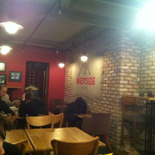 Photo taken at Westside Cafe Bistro by Tarkan A. on 3/16/2012