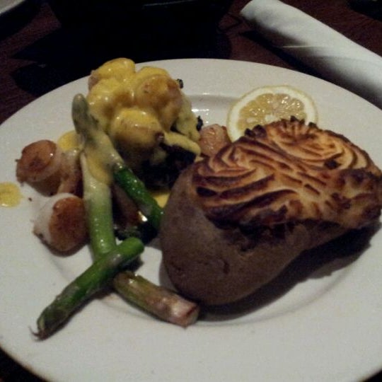Photo taken at The Keg Steakhouse + Bar - Arlington by Meg M. on 2/16/2012