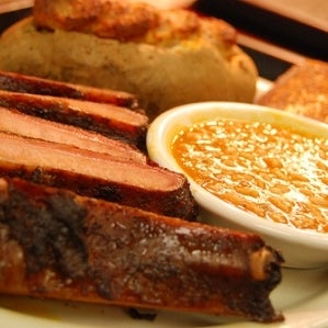 Van's has some of the best barbecue around.  Try the ribs or the barbecue chicken, and don't forget to add curly fries!