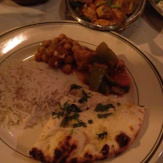 Photo taken at Indian Oven by Natalie B. on 3/23/2012