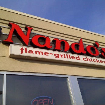 Photo taken at Nando&#39;s by Andre L. on 8/17/2011