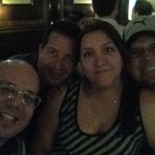 Photo taken at Lizzy McCormack&#39;s Irish Bar by Luis and Mary T. on 3/3/2012