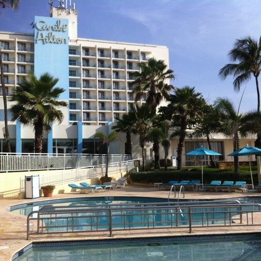 Photo taken at Condado Lagoon Villas at Caribe Hilton by Barcelona Tapas on 5/19/2012