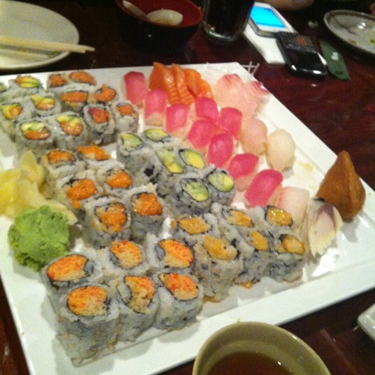 Photo taken at Sushi Kingdom by Nhung T. on 5/5/2012
