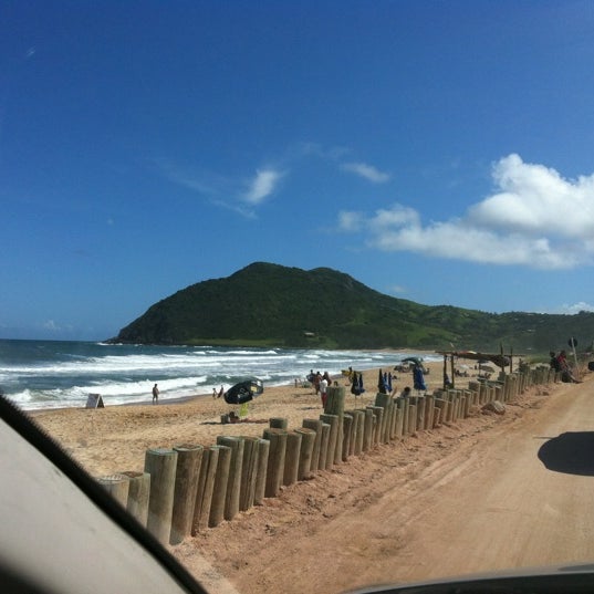 Photo taken at Praia da Silveira by David R. on 1/10/2012