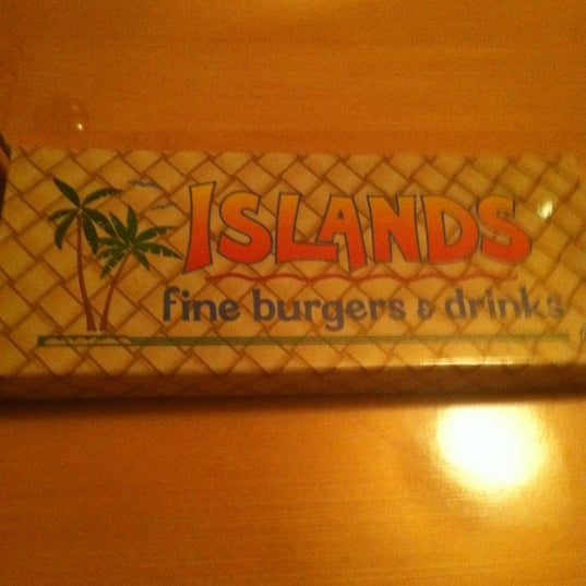 Photo taken at Islands Restaurant by Mikey M. on 3/5/2012