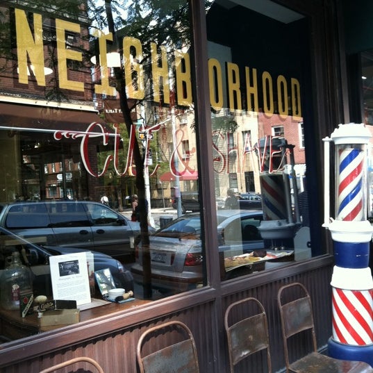 Photo taken at Neighborhood Cut and Shave Barber Shop by Erin on 9/3/2011
