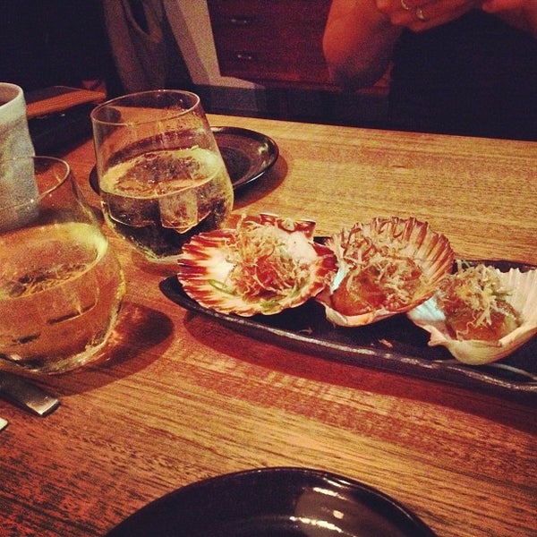 Photo taken at Kumo Izakaya &amp; Sake Bar by Liisa V. on 3/15/2012