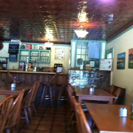Photo taken at Bambinos Cafe on Delmar by John P. on 5/15/2012