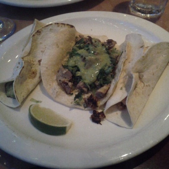 Photo taken at Ponche Taqueria &amp; Cantina by Laurent R. on 6/21/2012