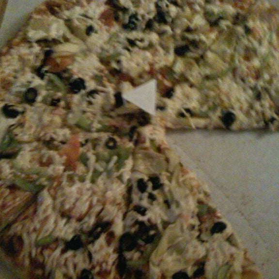 Foto tirada no(a) Grey Block Pizza por Michelle em 1/15/2012