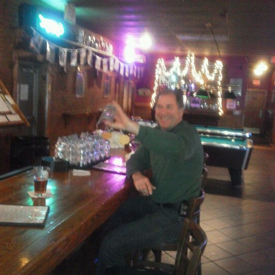 Photo taken at Lucky Lou&#39;s Tavern by Grant D. on 12/9/2011
