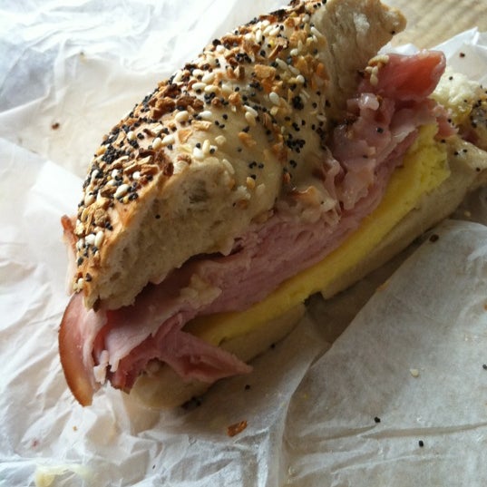 Photo taken at Cape Cod Bagel Cafe by Justin D. on 3/10/2012