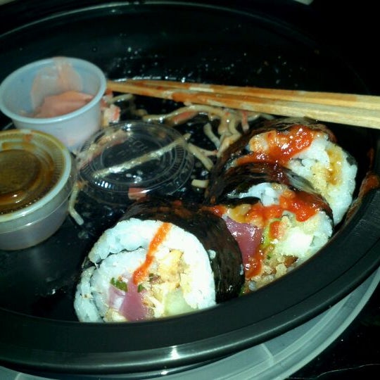 Photo taken at Rollbotto Sushi by Catcher S. on 1/27/2012