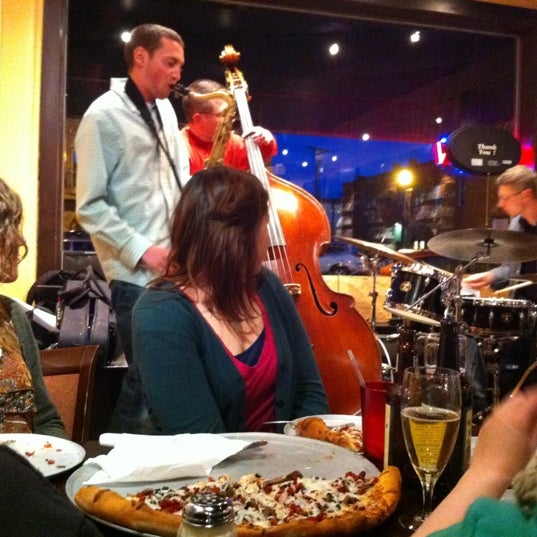 3/18/2012 tarihinde Russ W.ziyaretçi tarafından Rico&#39;s Cafe &amp; Wine Bar'de çekilen fotoğraf