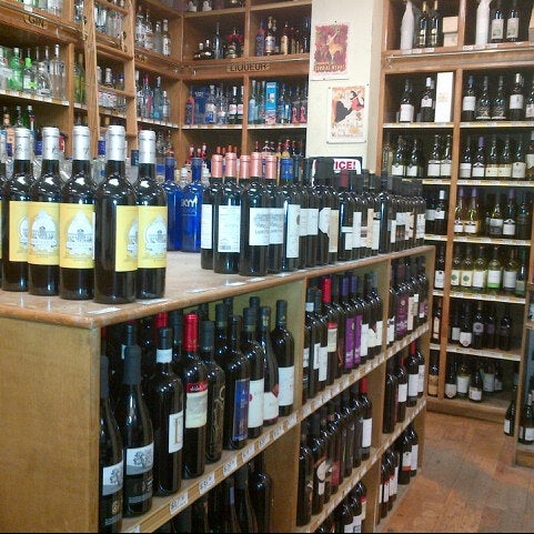 Photo taken at Gotham Wines &amp; Liquor by Kristin W. on 8/30/2012