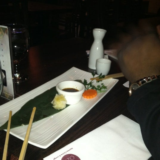 Photo taken at Ozu Japanese Cuisine &amp; Lounge by Jen L. on 4/15/2012