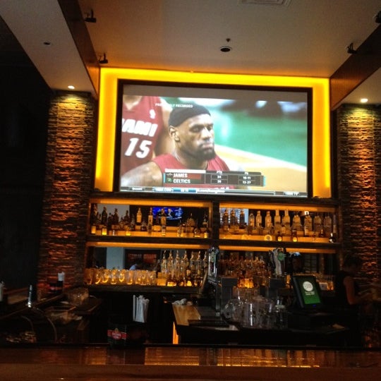 Photo taken at Homefield Sports Bar &amp; Grill by Leslie S. on 6/9/2012