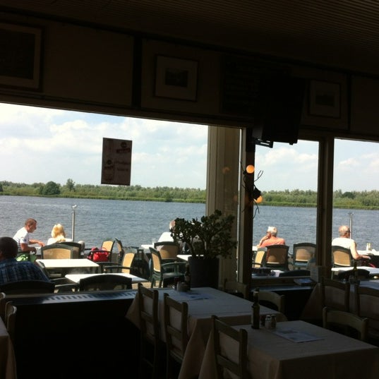 Photo taken at Het Panorama Restaurant/Grand-Café by Guido V. on 6/26/2012