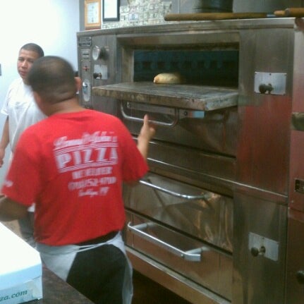 Photo taken at Lenny &amp; John&#39;s Pizza by Ava D. on 8/22/2012