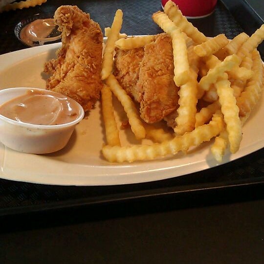 Photo taken at Raising Cane&#39;s Chicken Fingers by J M. on 4/13/2012