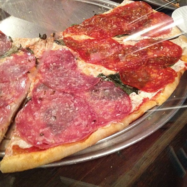 Photo taken at South Brooklyn Pizza by Deryck L. on 6/22/2012