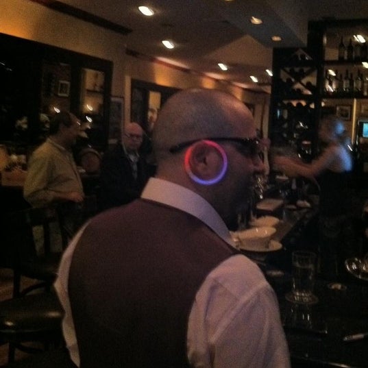 Photo taken at Olla Wine Bar by Gianluca D. on 7/25/2012
