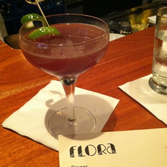 Photo taken at Flora Restaurant &amp; Bar by barleypop b. on 4/1/2012