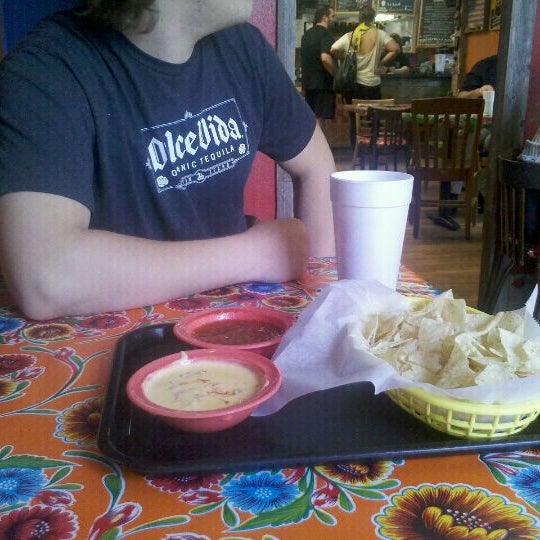 Photo taken at Paco&#39;s Tacos by Jade L. on 4/27/2012