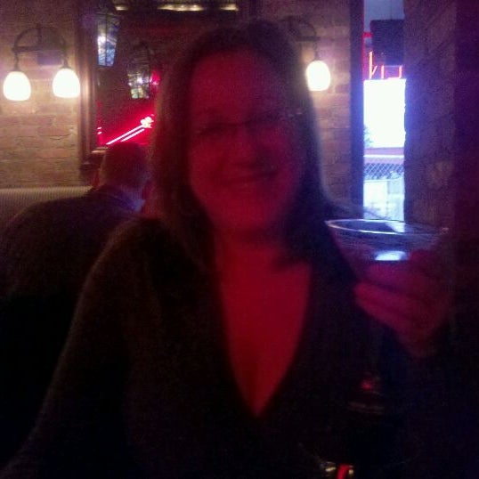 Photo taken at Latitude 48 Bistro &amp; Red Room Basement Bar by Keith P. on 4/7/2012