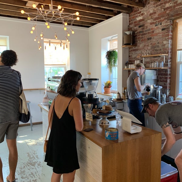 Photo taken at Tandem Coffee Roasters by Dennis W. on 7/29/2019