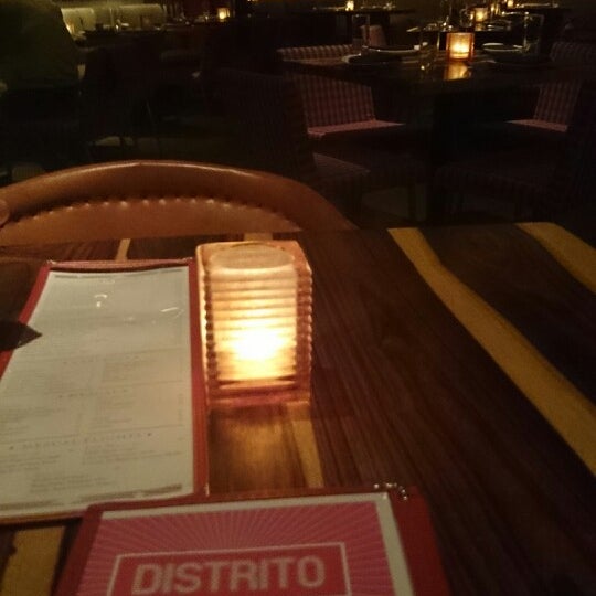 Photo taken at Distrito by Iron Chef Jose Garces by Christopher V. on 7/28/2014